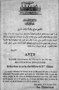 1910 tarihli Hüdavendigar gazetesi ilanı: MEdine-i Bursa Demiryolu Osmanlı şirketi logosu ve 2. mevki ile biletlerin fiyat tenzili